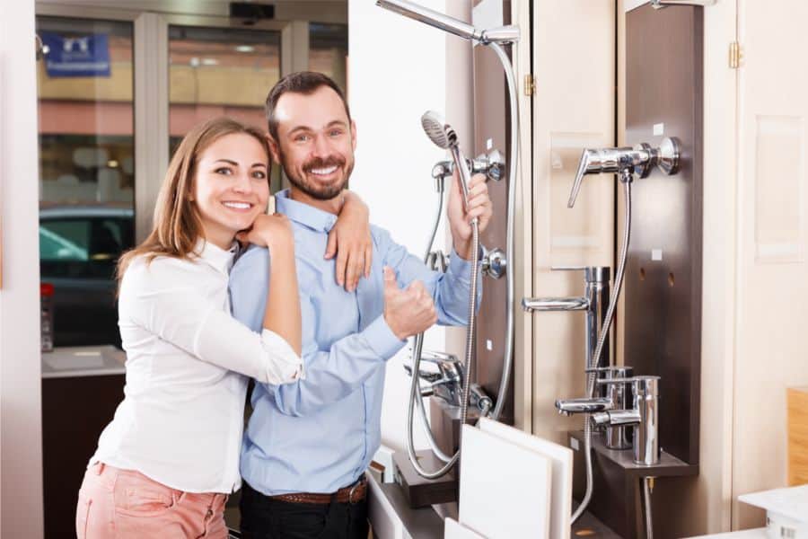 Couple selecting faucets in design center